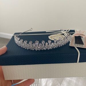 Rhinestone tiara never worn. Includes Bobby pins and box.